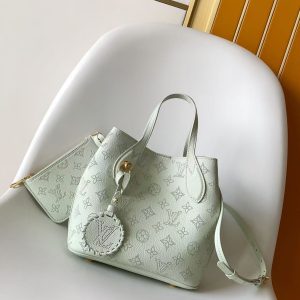 Alternative view of p660M23196 Pink MBlossom Small Handbag features perforated calf leather, blending practical functionality with a relaxed aesthetic. An interior compartment includes a removable zippered pouch for daily essentials. The handles allow for hand-carry or elbow-carry, while the removable and adjustable shoulder strap offers shoulder and crossbody options.20.0 x 20.0 x 12.5 cm (L x H x W) • Perforated embossed cowhide leather • Cowhide leather trim • Microfiber lining • Metal hardware